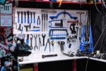 A bicycle workshop with tools and bikes on repair stands