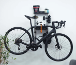 SpaceRail ONE wall-mounted bike storage unit with a road bike displayed