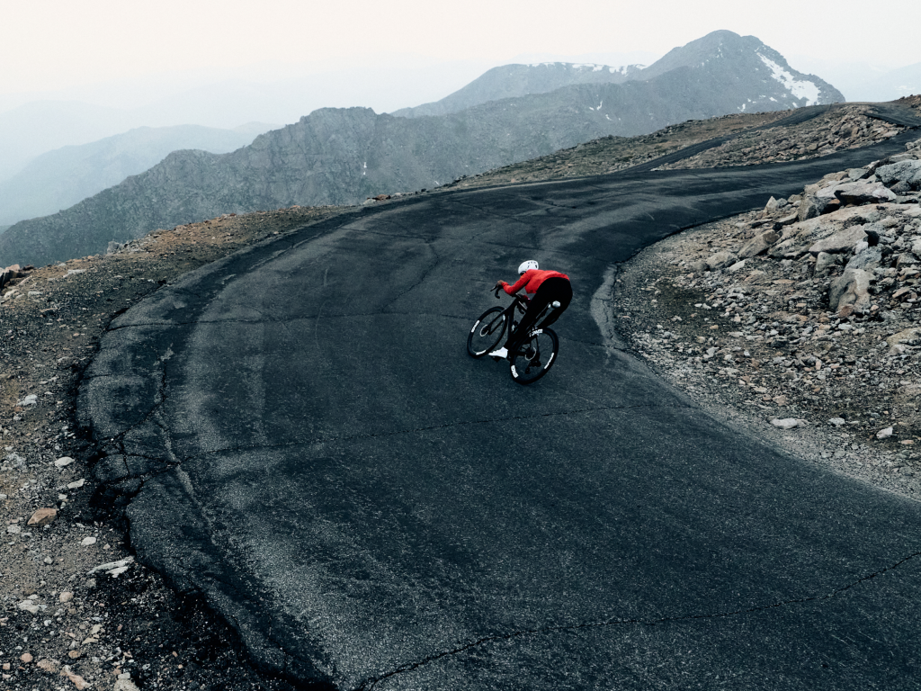 Cyclist wearing MAAP cold-weather road cycling kit