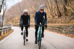 Cyclist wearing a Castelli winter jacket riding in wet conditions